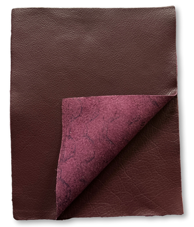 Close-up of Burgundy Cowhide Leather Sheets, 8.5 × 11 in showing grain, texture, and finish