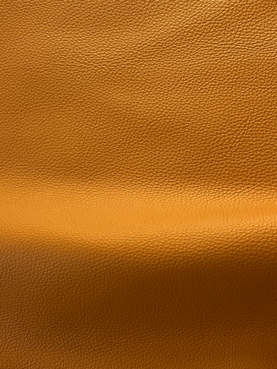 Saddle Premium Upholstery Cowhide surface detail showing texture and finish