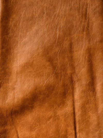 Caramel Antique Distressed Upholstery Cowhide shown in a full product view