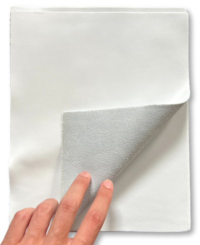 Close-up of White Smooth Cowhide Sheets, 8.5 × 11 in showing grain, texture, and finish