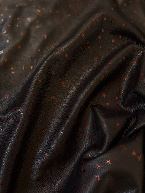 Close view of Black and Red Star Natural Grain Chrome-Tanned Cowhide with Italian foil finish