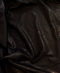 Black and red star Natural Grain Chrome-Tanned Cowhide draped to show its soft hand and pebble grain
