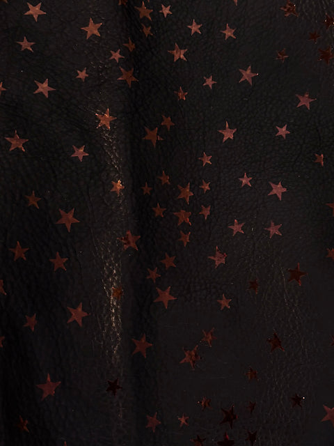 Texture detail of the red star Italian foil finish on black Natural Grain Chrome-Tanned Cowhide