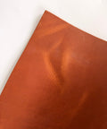 Tan Crazy Horse cowhide 12 x 24 leather sheet showing the wax and oil pull-up effect