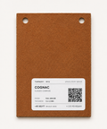 Back of an upholstery leather swatch showing the TanneryNYC QR code product label