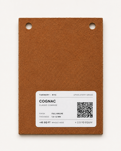 Back of an upholstery leather swatch showing the TanneryNYC QR code product label