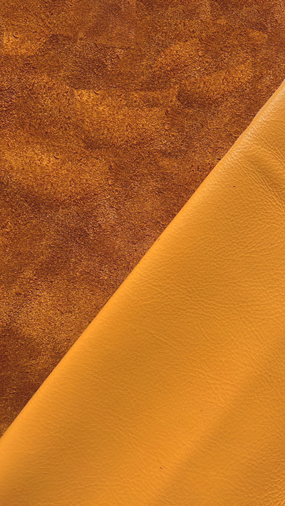 Close-up of Apricot Full-Aniline Cowhide showing grain, texture, and finish