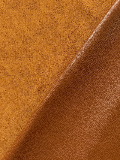 Close-up of Cognac Full-Aniline Cowhide showing grain, texture, and finish